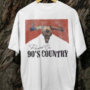 Distressed vintage style raised on 90s country tshirt
